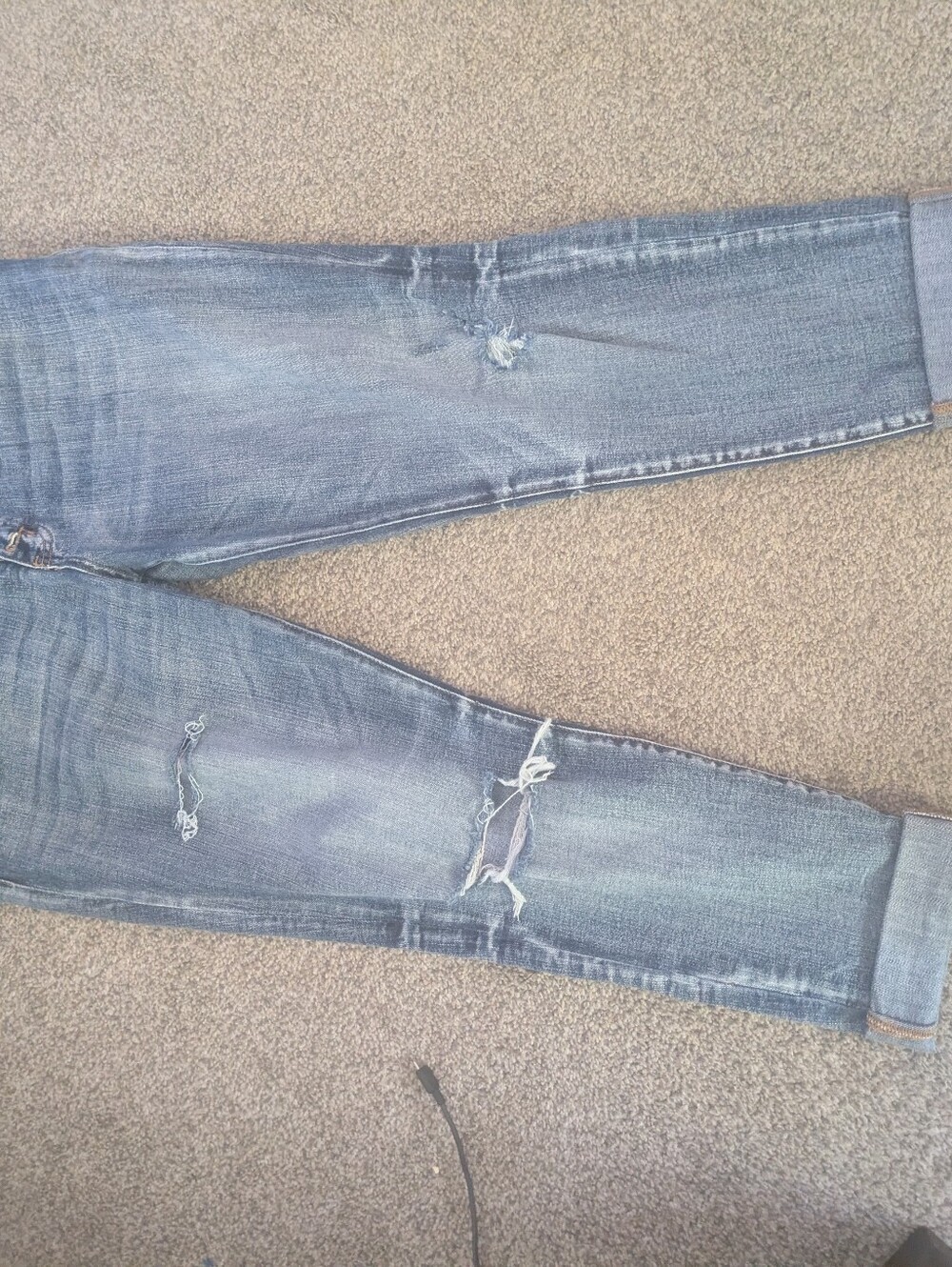Distressed Blue Denim Jeans - Light Wash